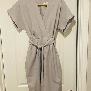 Dress with back gold zipper and slant opening in front skirt Gray